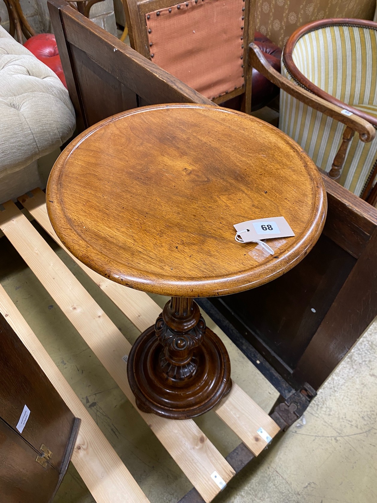 A Victorian circular mahogany wine table, diameter 39cm, height 71cm